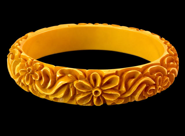 yellow all over deep floral carving bakelite bangle